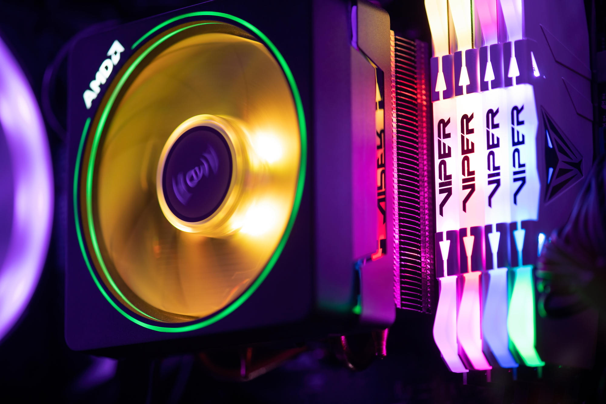 PISA, ITALY - FEBRUARY 2020: Amd and Viper memory chips with flashing lights inside the computer case.