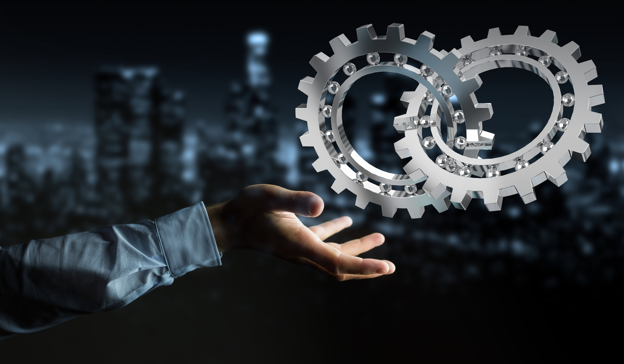 Businessman on blurred background using floating gear icons 3D rendering